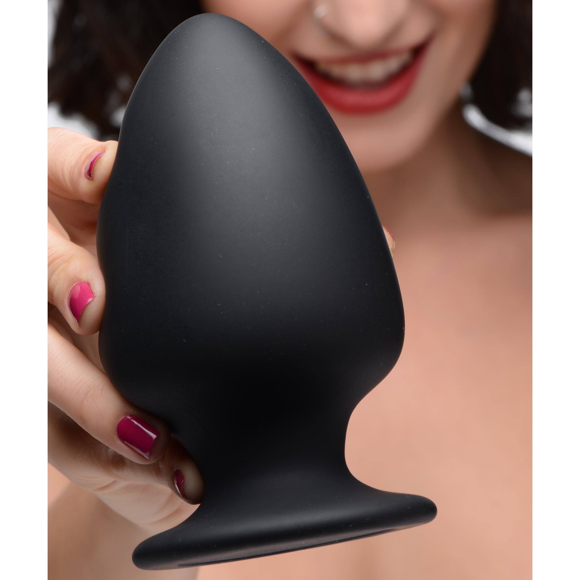 Squeeze-It Silicone Anal Plug - Large, featuring a flexible design and classic spade shape in sleek black color.