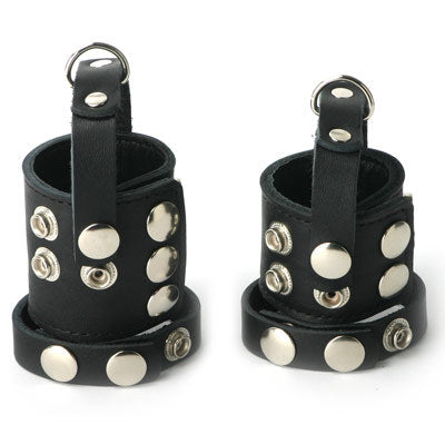 Strict Leather Cock Strap and Ball Stretcher made of soft leather and cold steel, showcasing its adjustable features and sturdy design.