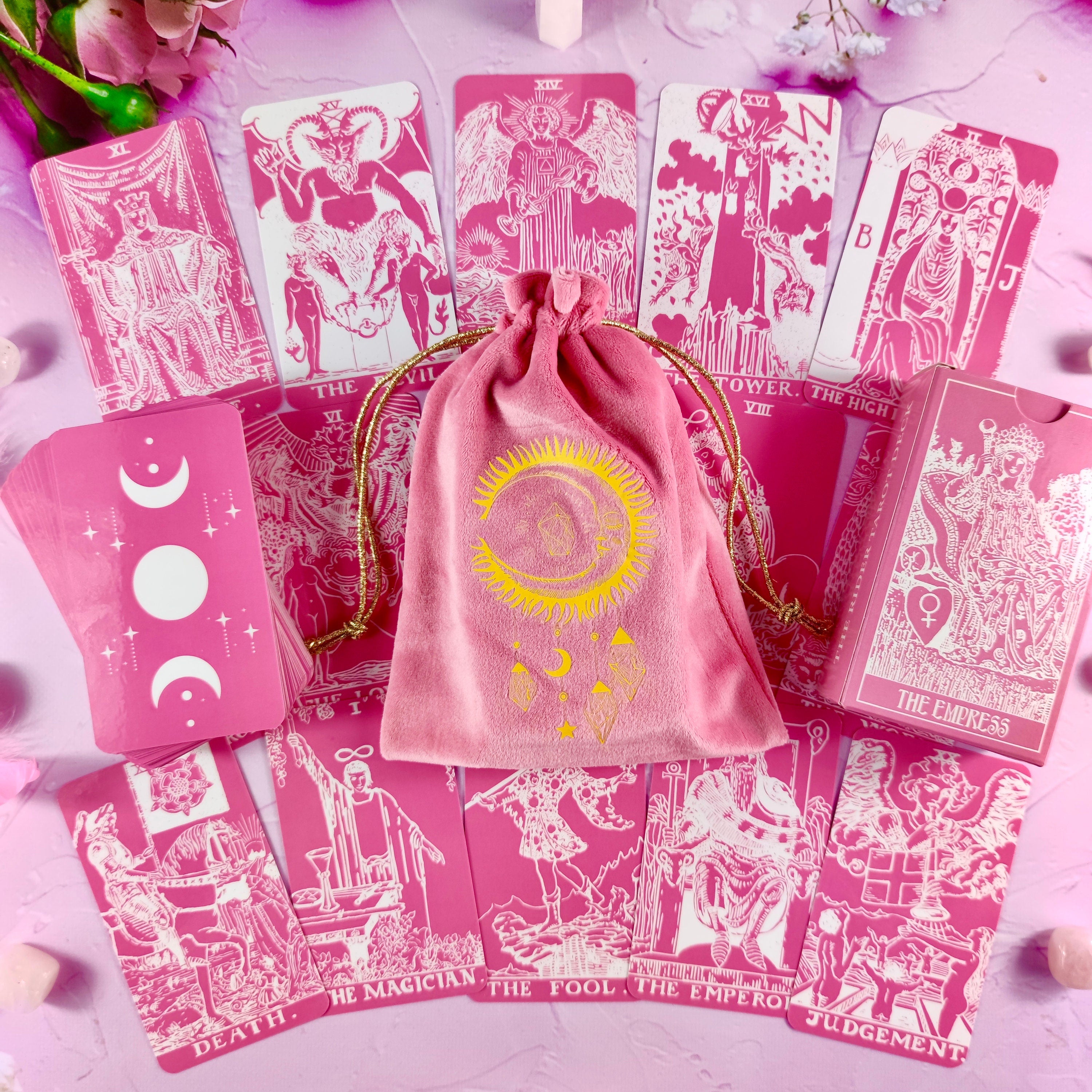 A soft pink velvet bag designed for tarot cards, featuring a durable construction and elegant appearance, perfect for tarot enthusiasts.