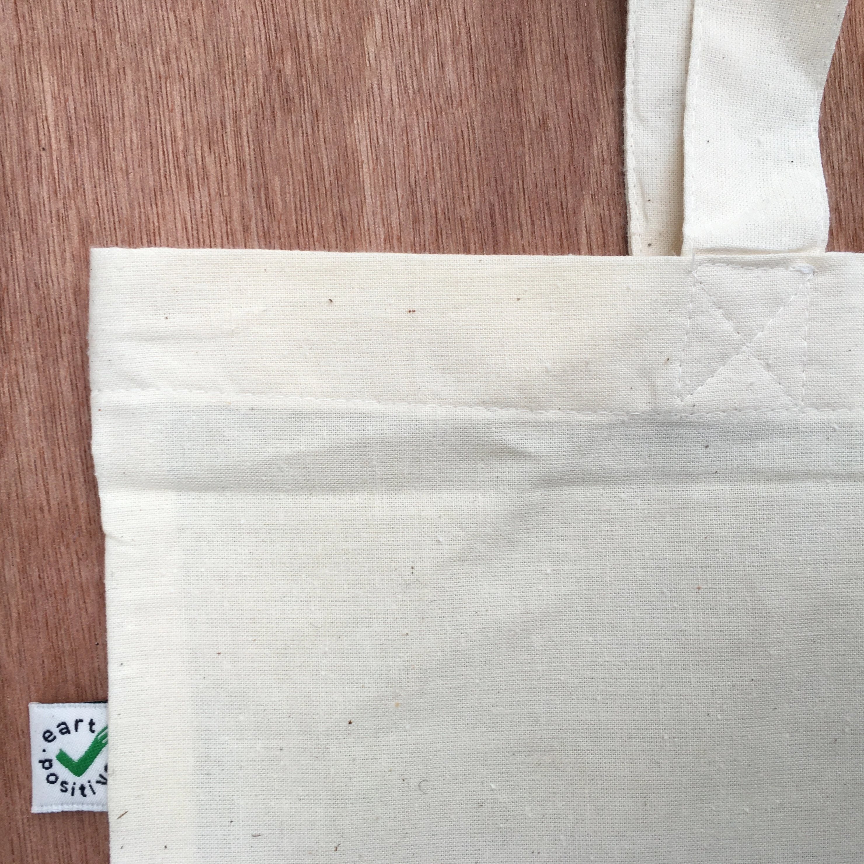 Crap Ice-cream Bar Bag made from organic cotton, featuring a hand-printed design in black ink on both sides, perfect for carrying various items.