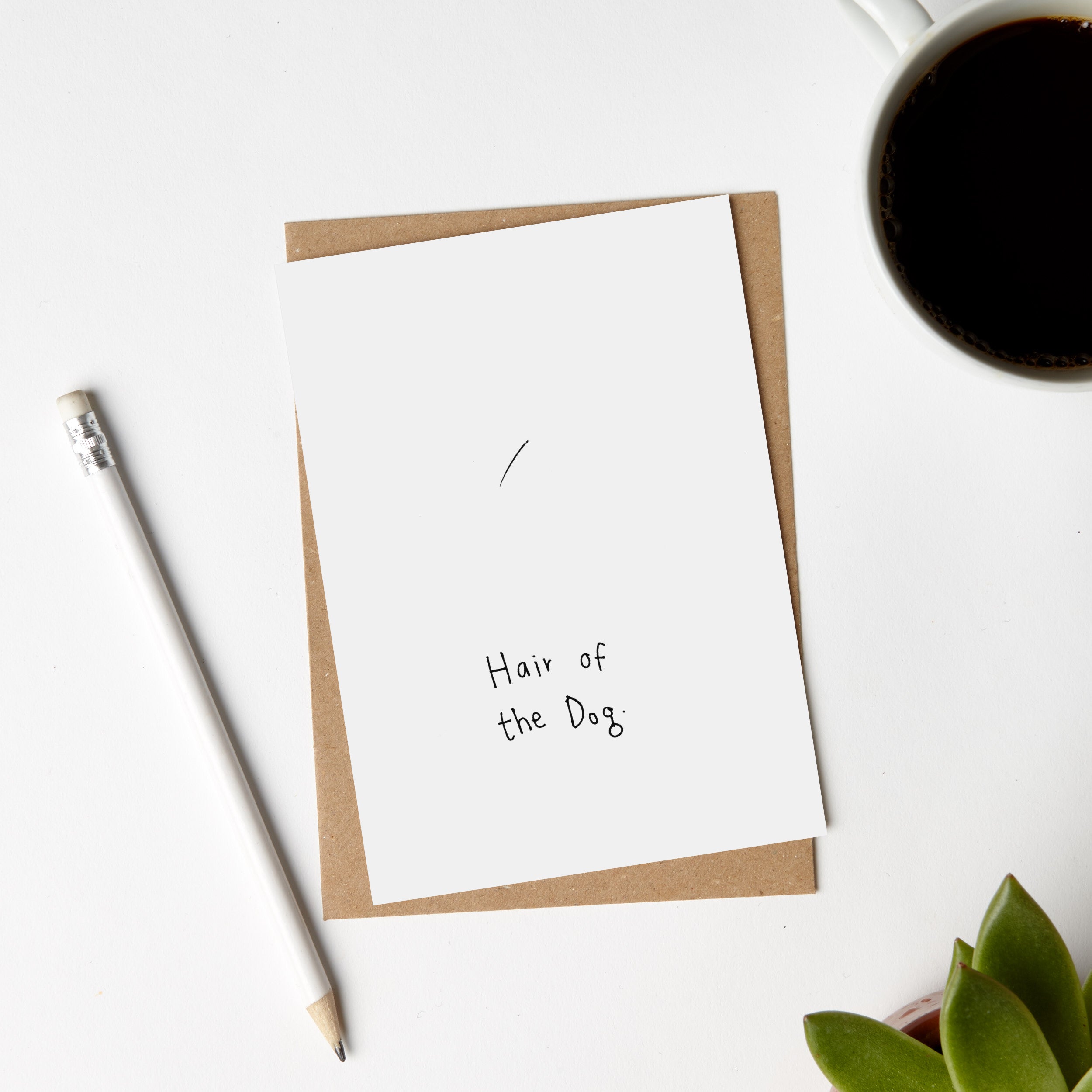 Eco-friendly Hair of the Dog Card made from recycled materials, featuring vegetable ink printing and a blank interior for personal messages.