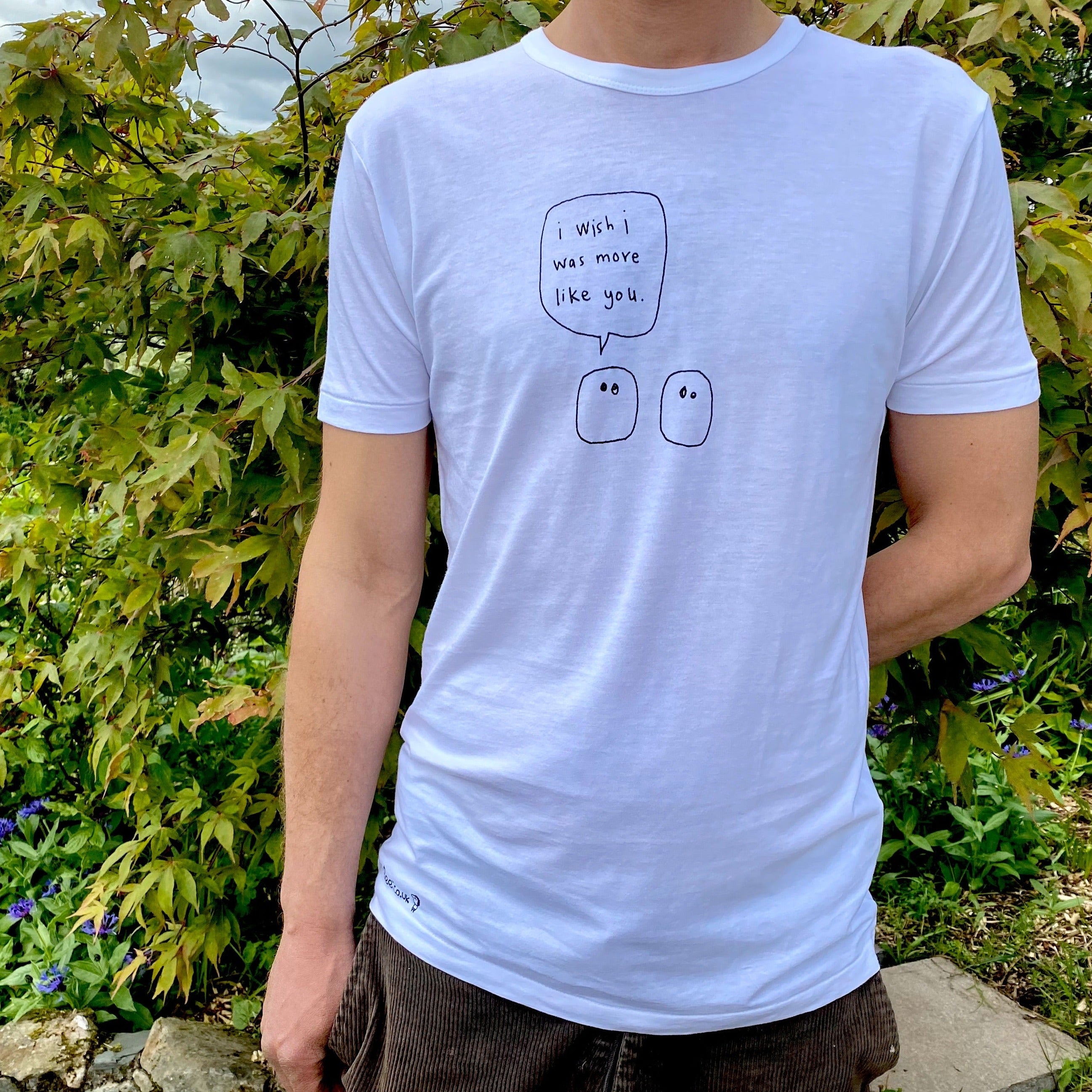 More Like You Blobs Bamboo Tee Shirt in black ink on white fabric, featuring a hand-printed logo at the hip.