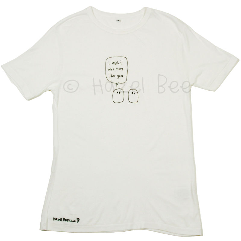 More Like You Blobs Bamboo Tee Shirt in black ink on white fabric, featuring a hand-printed logo at the hip.