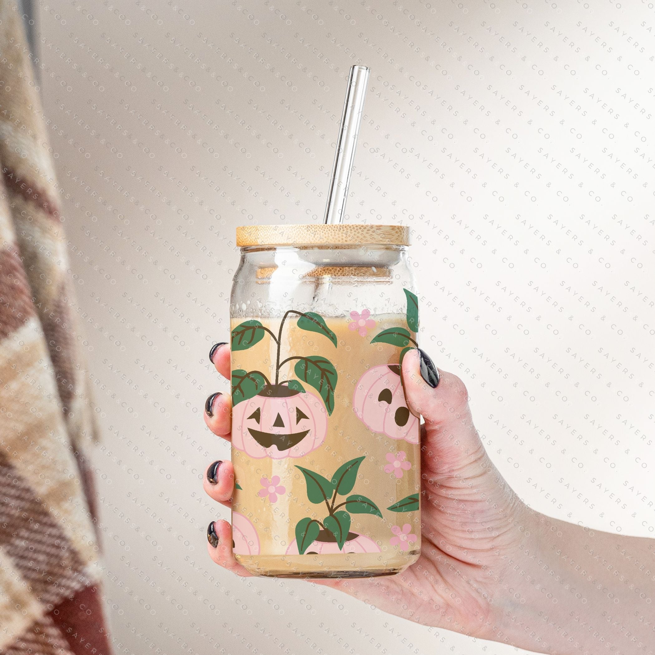16oz Pumpkin Planters Glass Cup with bamboo lid and straw, featuring a seasonal pumpkin design, perfect for fall beverages.