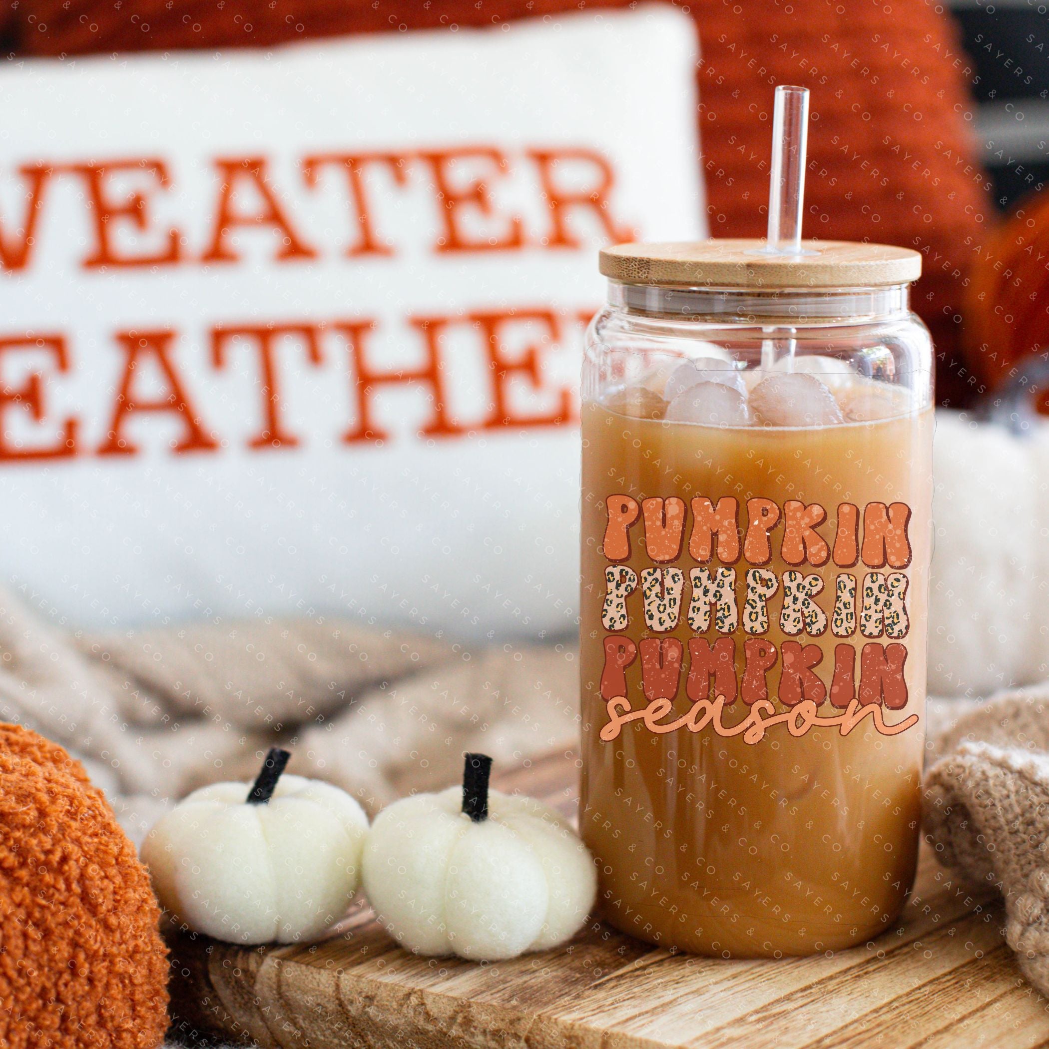 16oz Pumpkin Season Glass Cup featuring a bamboo lid and straw, perfect for fall beverages.