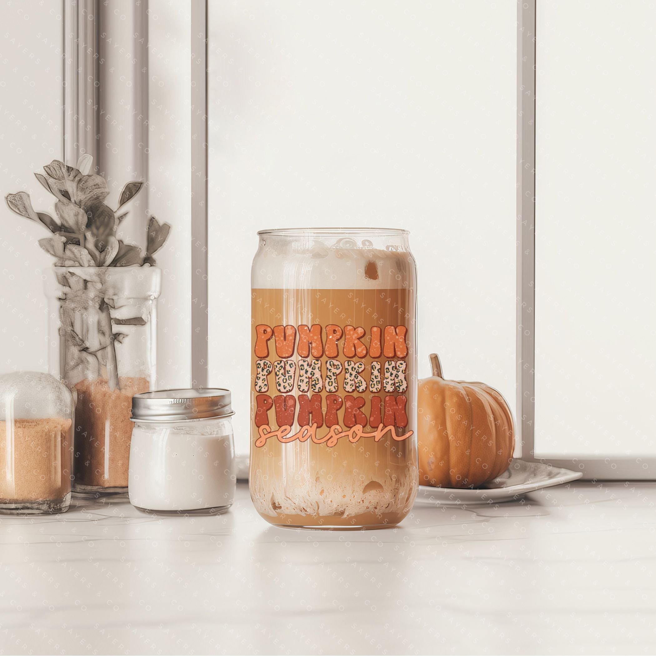 16oz Pumpkin Season Glass Cup featuring a bamboo lid and straw, perfect for fall beverages.