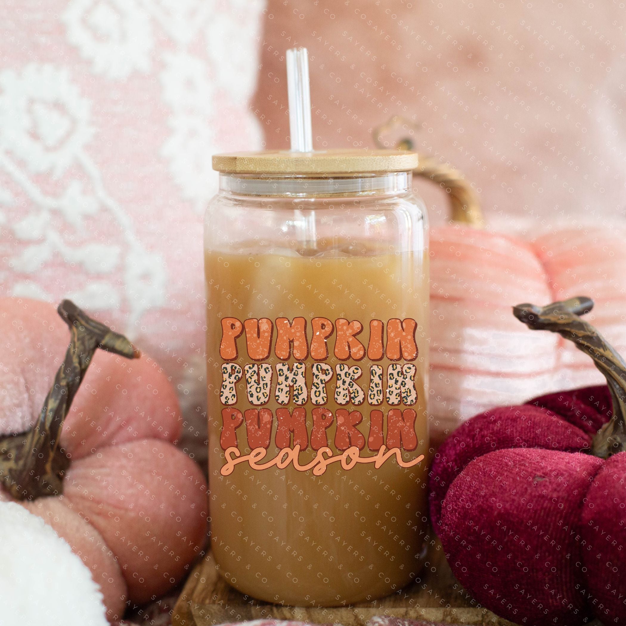 16oz Pumpkin Season Glass Cup featuring a bamboo lid and straw, perfect for fall beverages.
