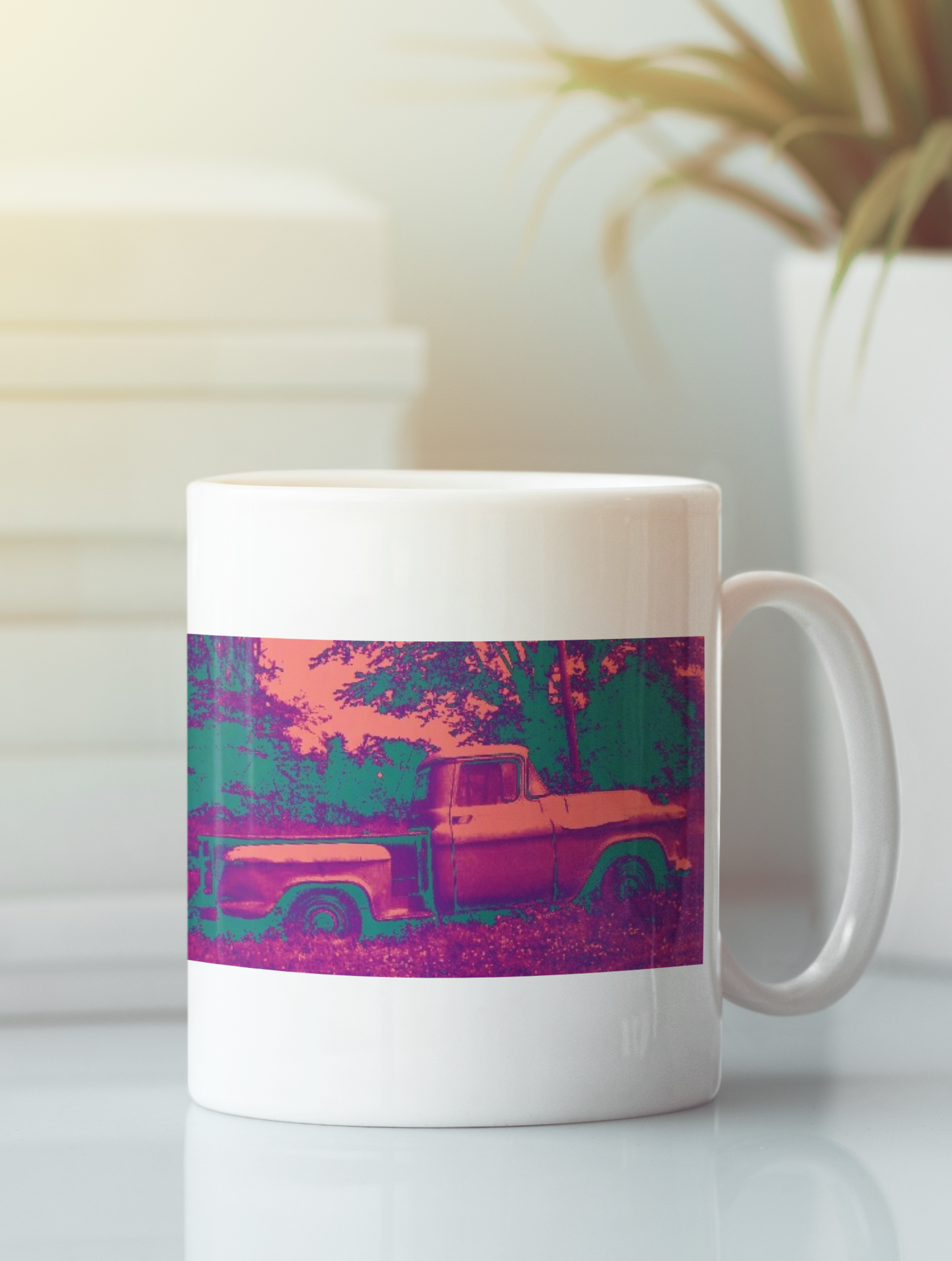 Ceramic coffee mug featuring a pop art design of a 1957 Chevrolet Apache Pickup Truck in red and black colors.