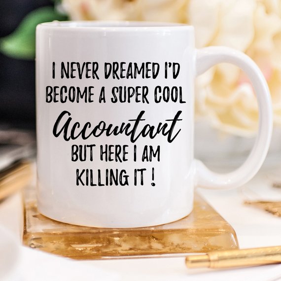 A stylish white ceramic mug featuring a vibrant accounting-themed design, perfect for gifting to accountants.