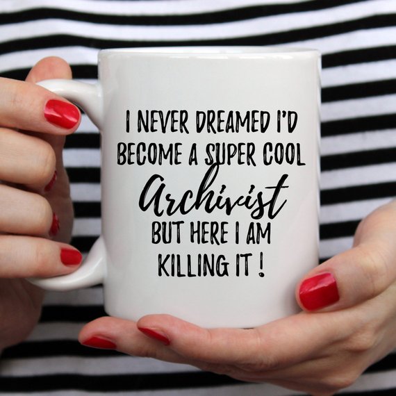 White ceramic Archivist Mug with funny design printed on both sides, showcasing vibrant colors and high-quality finish.