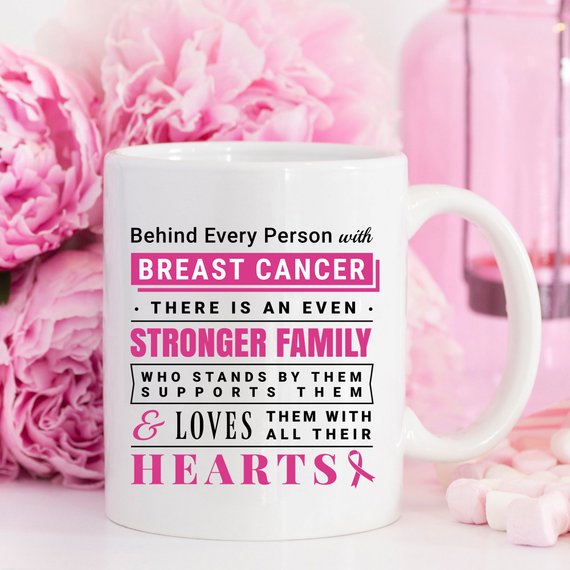 Ceramic coffee mug with a heartfelt message about breast cancer support, featuring vibrant colors and a unique design.
