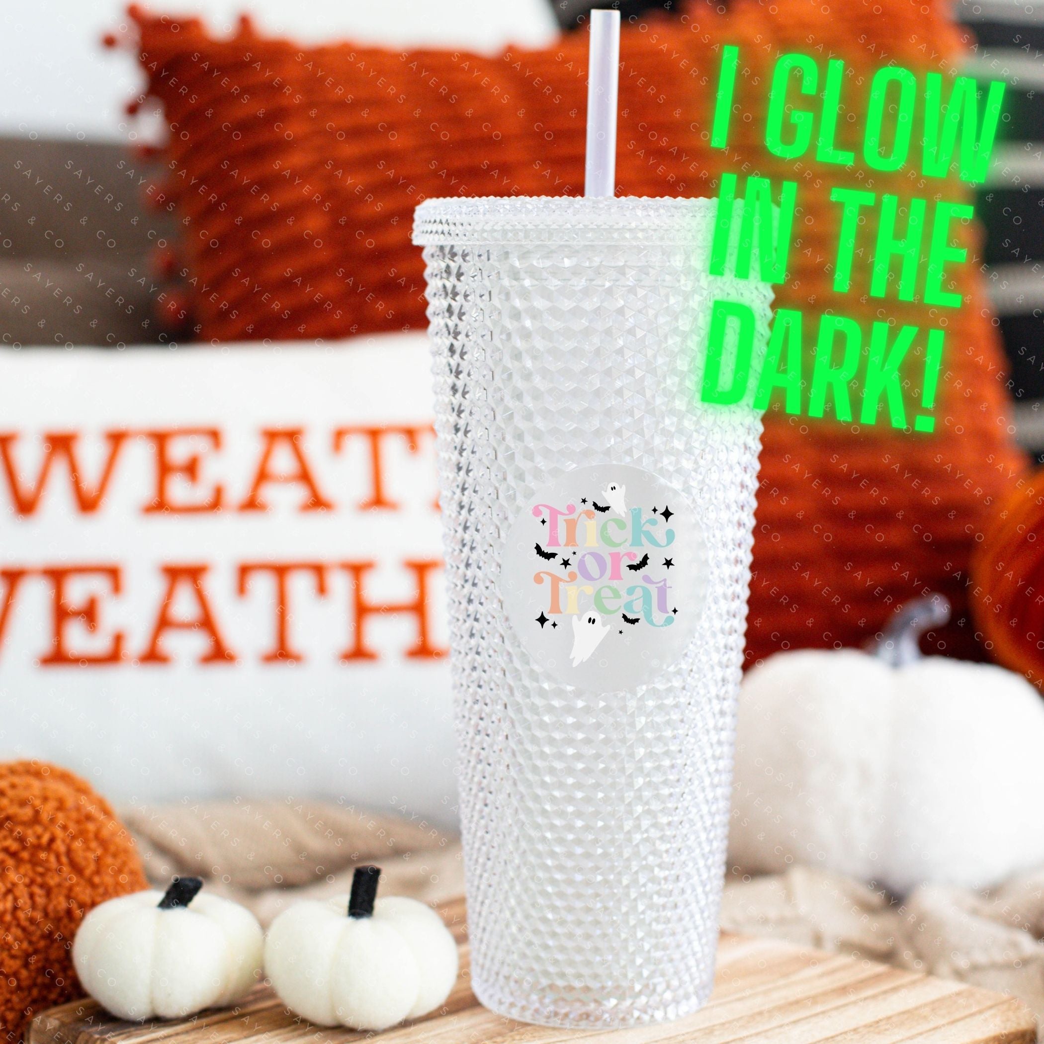 Custom Studded 24oz Double Walled Tumbler featuring a spooky design, complete with a lid and straw, perfect for Halloween celebrations.