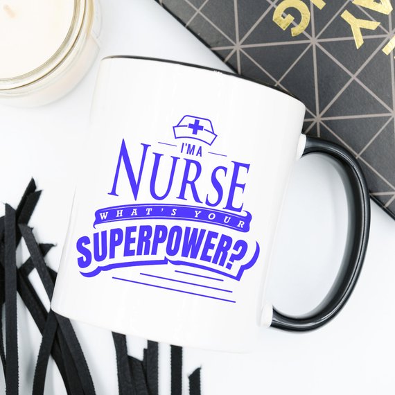 Funny Nurse Mug featuring the text 'I'm A Nurse, What's Your Superpower?' in bold letters, perfect for coffee lovers.