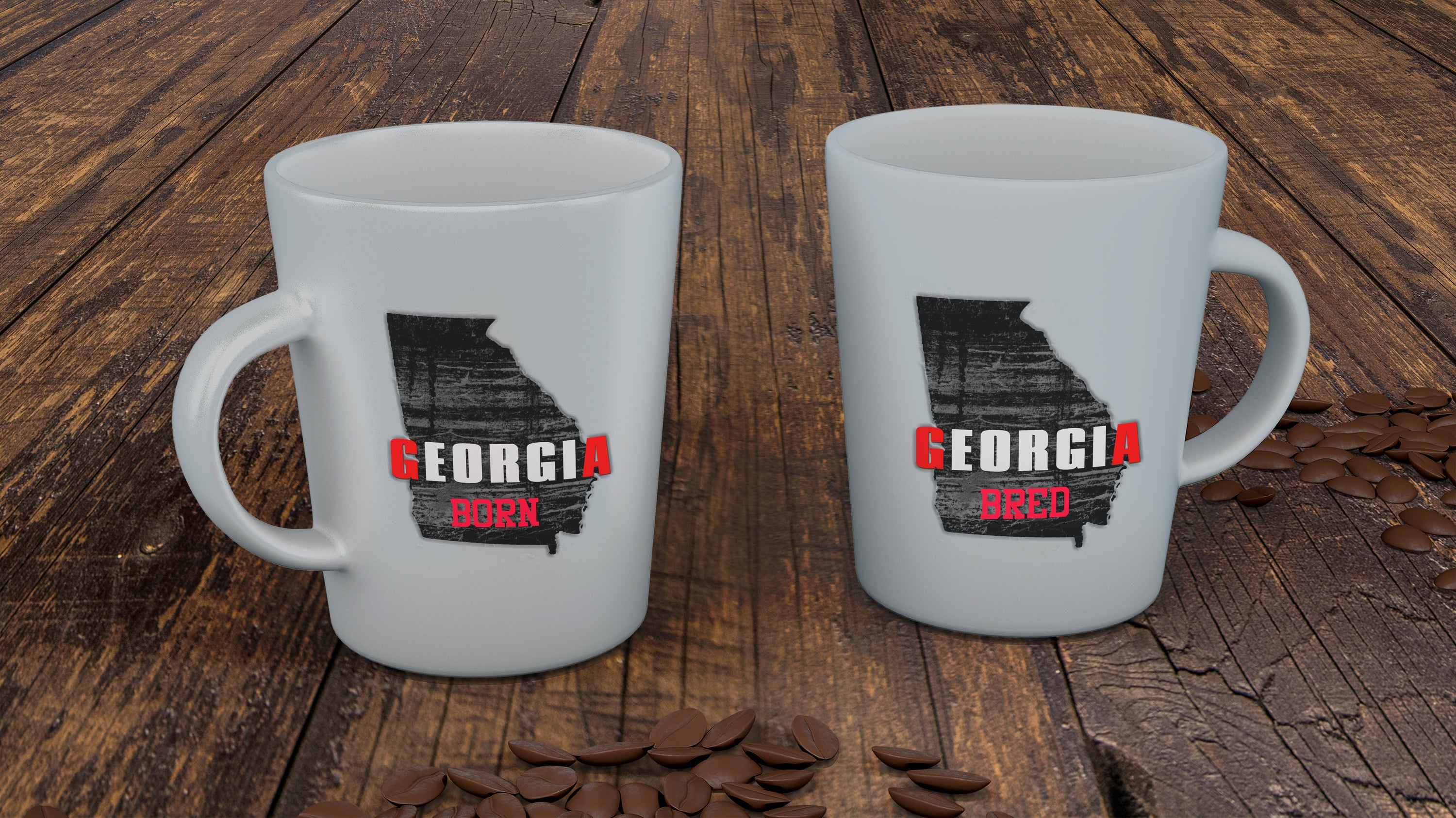 A glossy white ceramic mug featuring the phrase 'Georgia Born Georgia Bred', perfect for coffee and tea lovers.