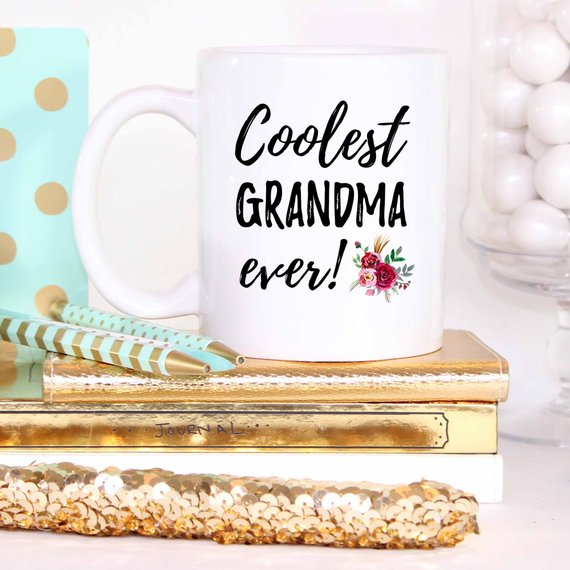 A white ceramic Grandma Mug featuring a vibrant design printed on both sides, perfect for Mother's Day gifts.