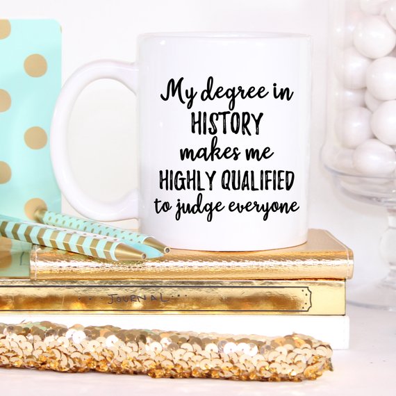 A stylish white ceramic mug featuring a vibrant history-themed design printed on both sides, perfect for historians and history enthusiasts.