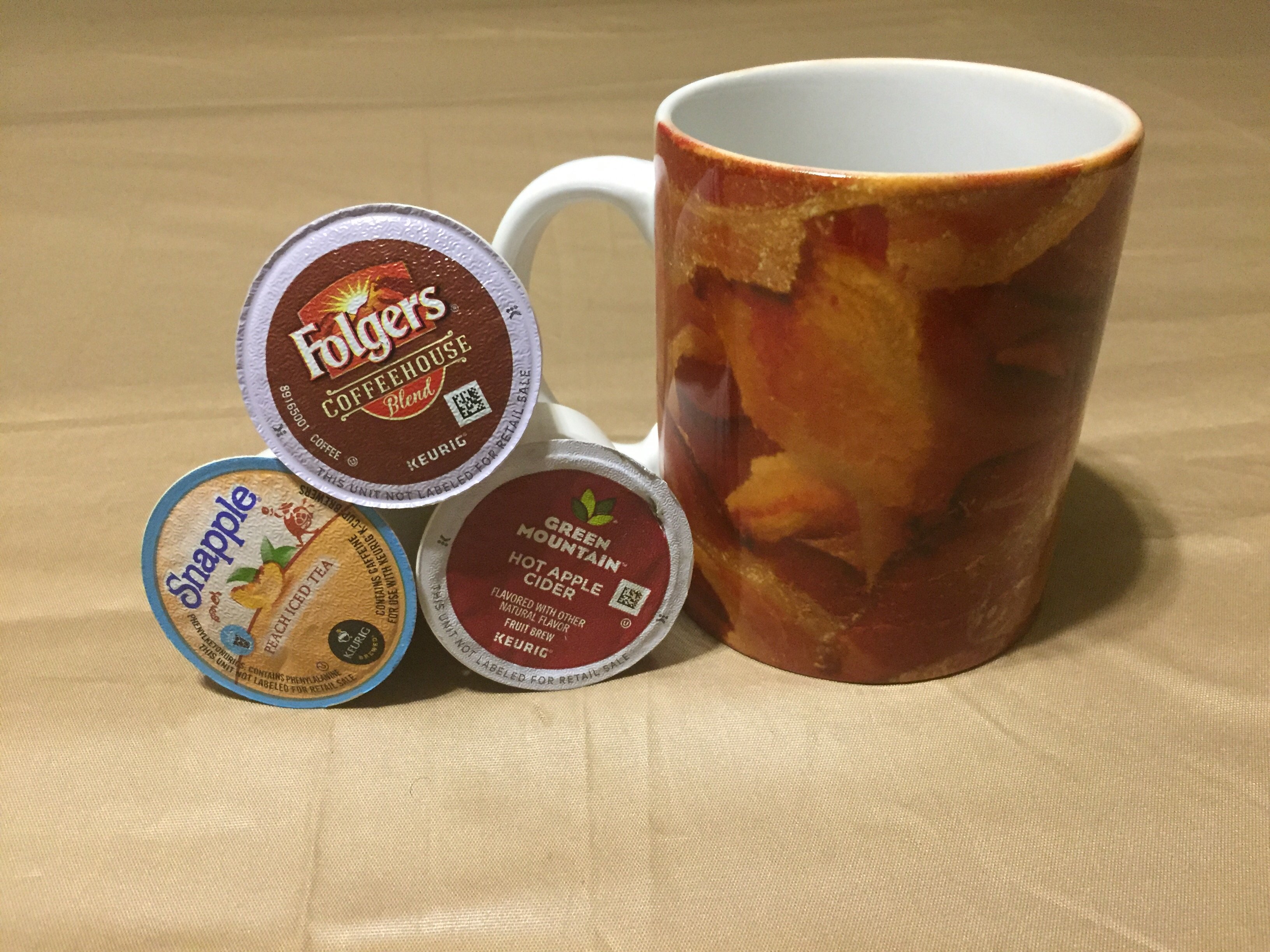 A glossy white ceramic mug with the phrase 'I Can Smell The Bacon' printed in a fun font, perfect for coffee or tea.