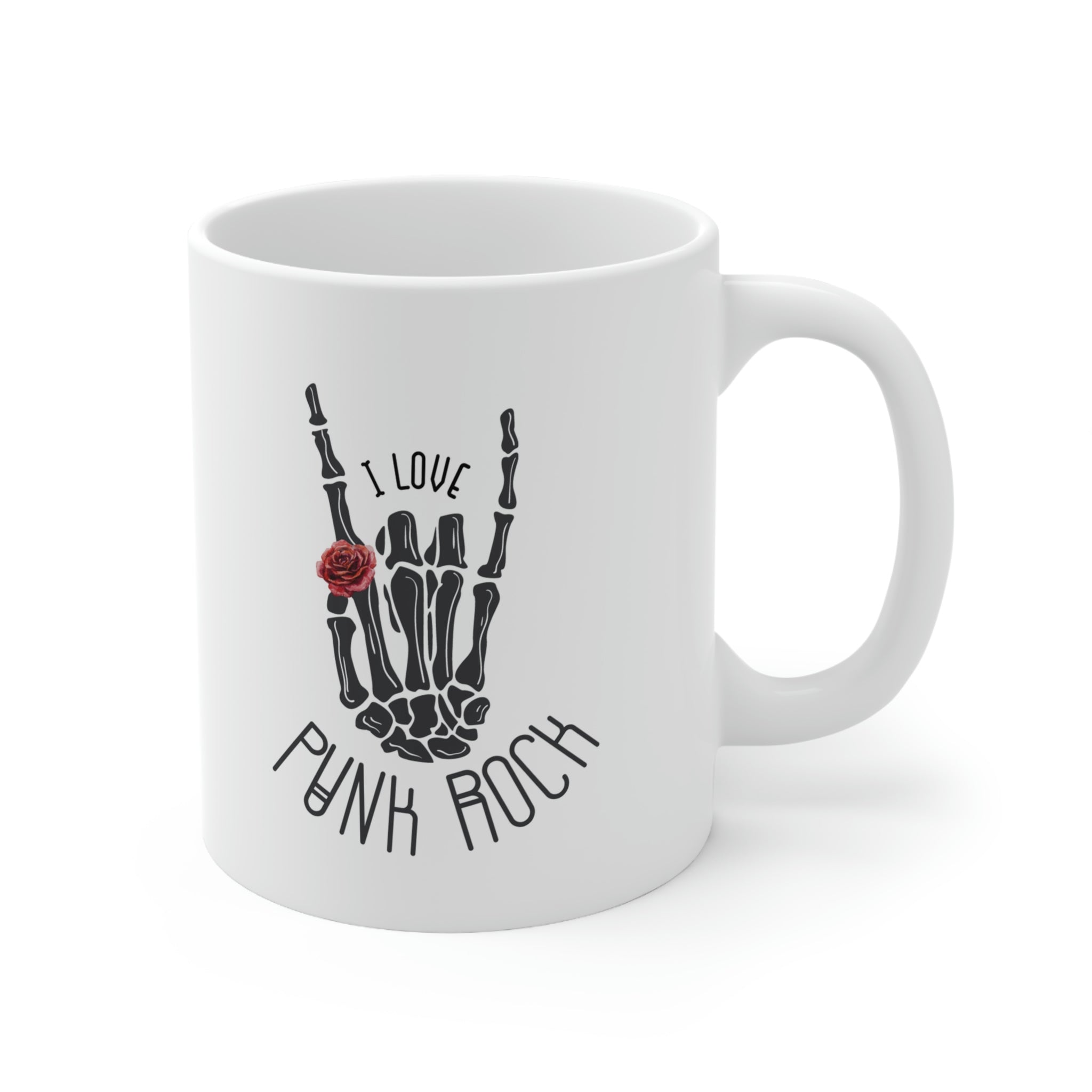 I Love Punk Rock Skeleton Hand Mug featuring a unique skeleton hand design on a white ceramic surface.