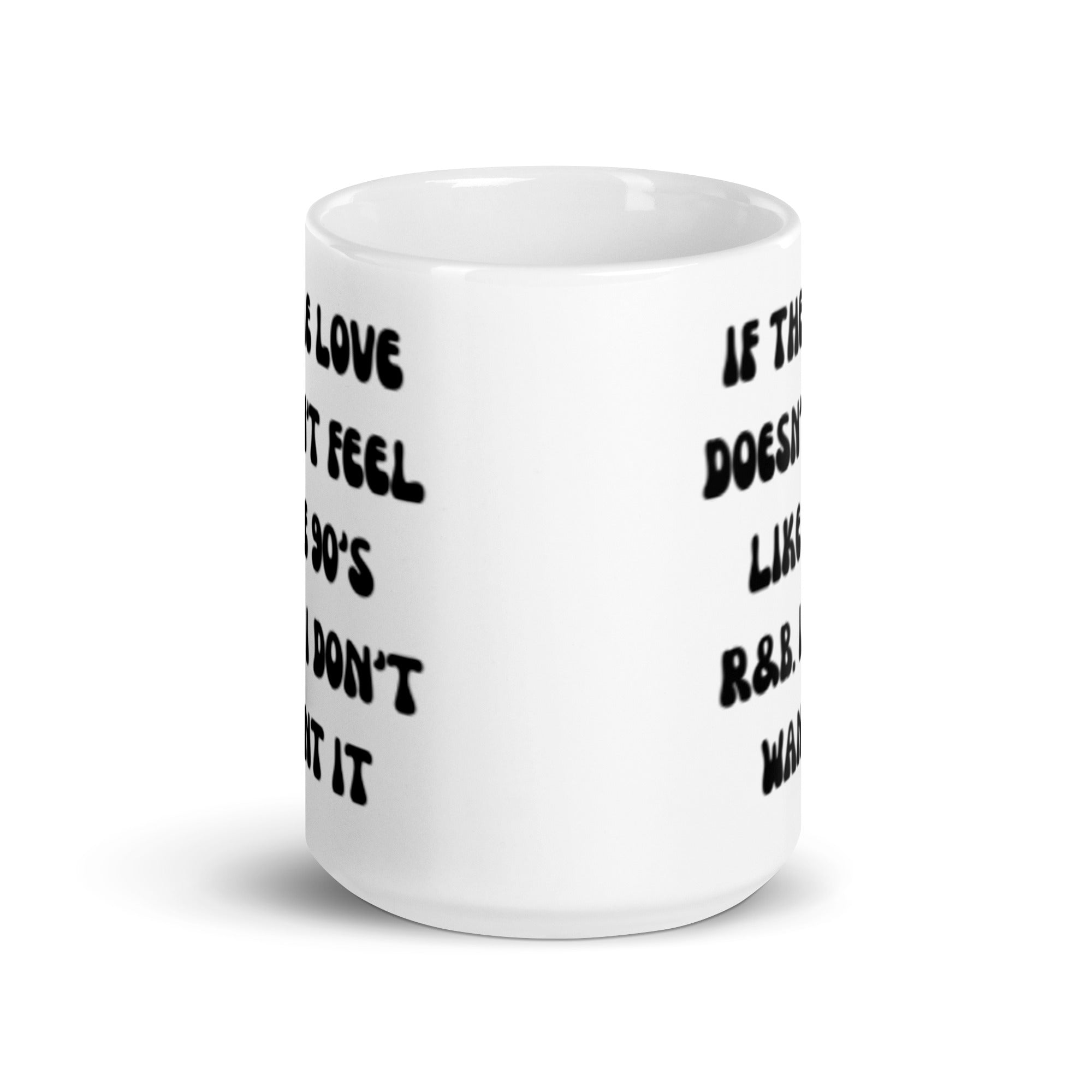 Ceramic mug featuring the phrase 'If The Love Doesn't Feel Like 90's R&B' printed on both sides, available in two sizes.