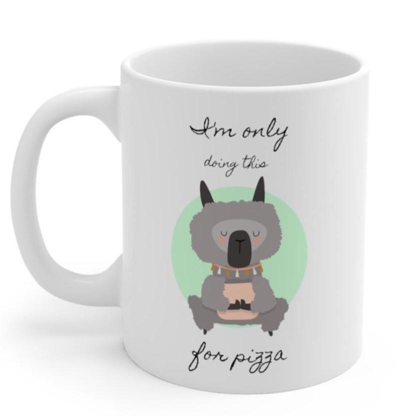 A white ceramic mug featuring a whimsical llama doing yoga, perfect for coffee, tea, and hot chocolate.