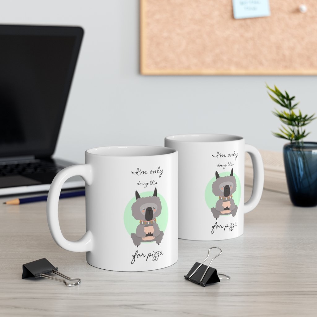 A white ceramic mug featuring a whimsical llama doing yoga, perfect for coffee, tea, and hot chocolate.