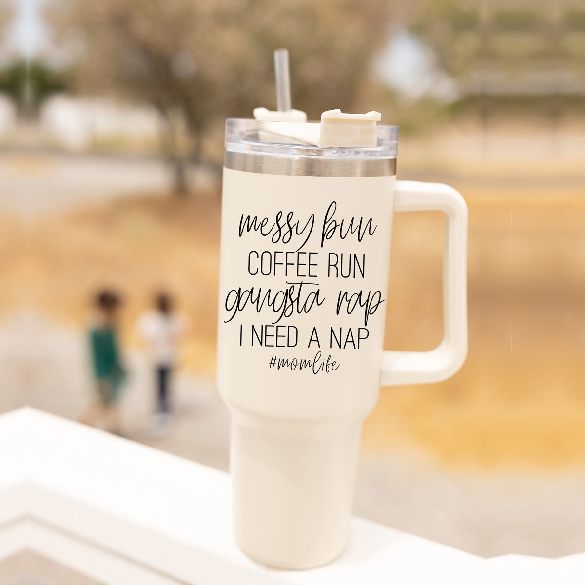 Messy Bun Mom Life 40oz insulated mug with a matte finish, featuring a black graphic design and a versatile 3-in-1 lid.