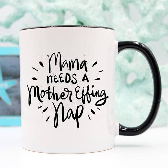 Funny coffee mug with the phrase 'Mama Needs A Mother Effing Nap' printed on it, showcasing a humorous design perfect for mothers.