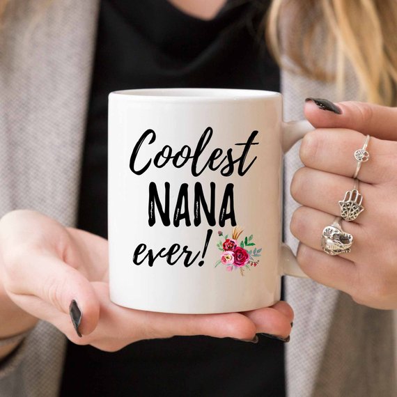 A stylish white ceramic Nana Mug featuring a vibrant design, perfect for Mother's Day gifts from daughters.