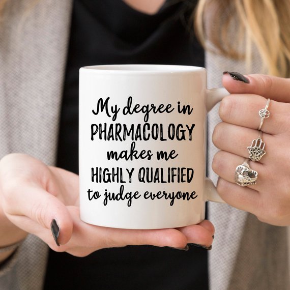 High-quality white ceramic mug with vibrant pharmacology design printed on both sides, perfect for pharmacists.