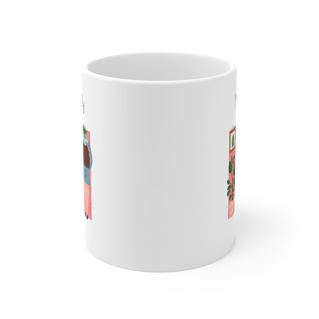 A stylish white ceramic coffee mug with a C-handle, perfect for plant lovers, featuring rounded corners and an elegant design.