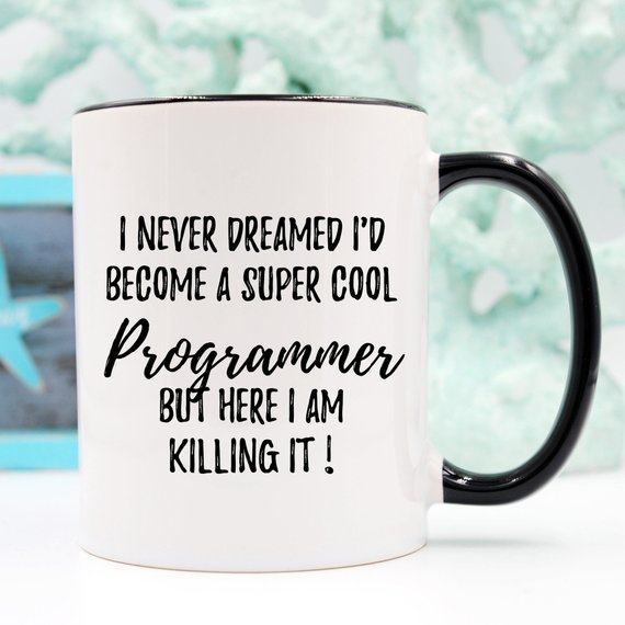 A white ceramic mug featuring a vibrant programmer-themed design, showcasing coding elements on both sides.