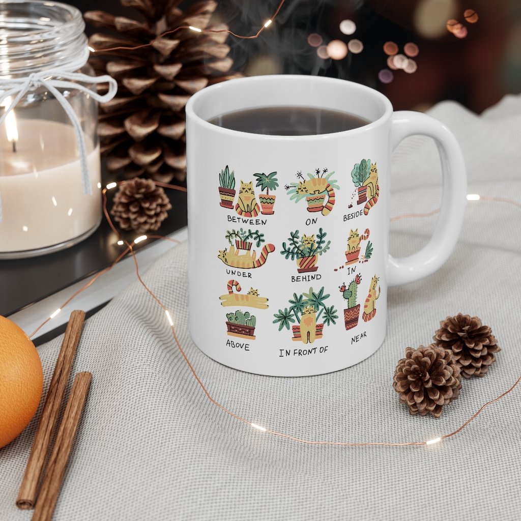 Puurfect Combo Cat and Plants Coffee Tea Mug featuring a white ceramic design with playful cat and plant illustrations.