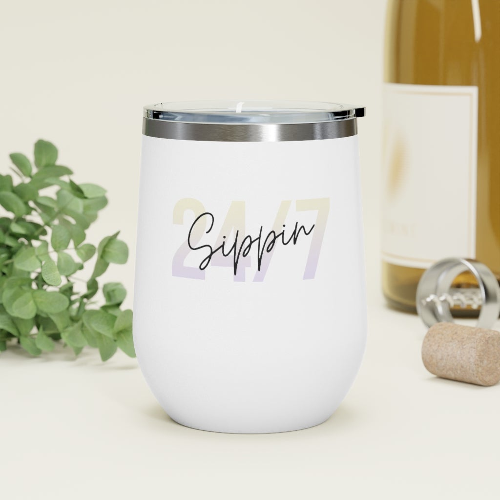 Sippin Insulated Wine Tumbler in white with clear lid, showcasing its sleek design and double-wall insulation.