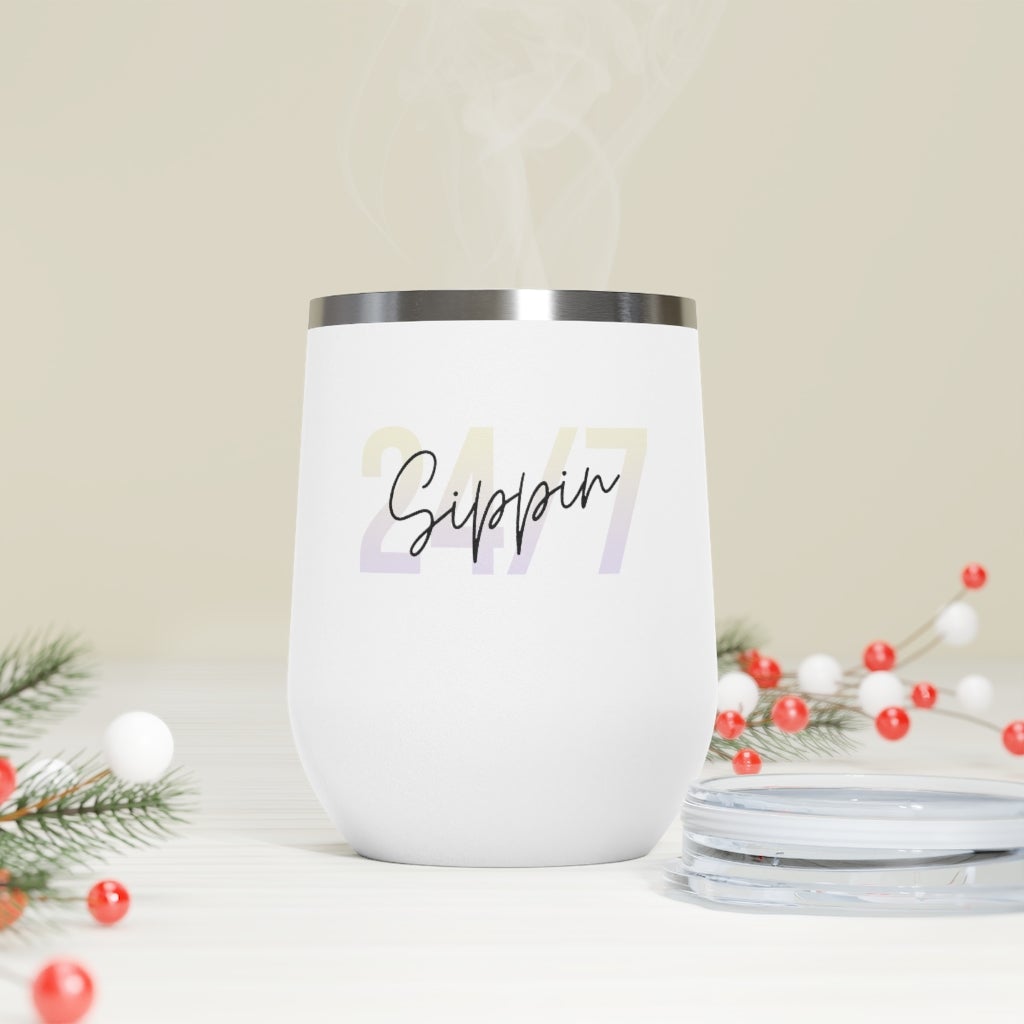 Sippin Insulated Wine Tumbler in white with clear lid, showcasing its sleek design and double-wall insulation.