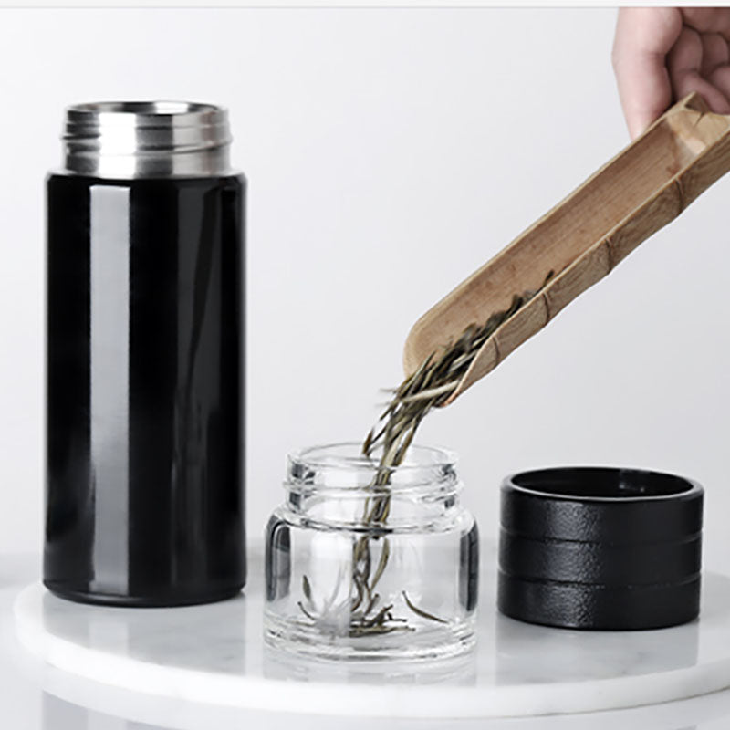 Smart Insulation Cup with Temperature Display in black and white, showcasing its sleek design and temperature display feature.