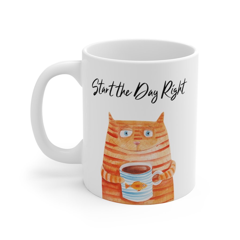 A white ceramic coffee mug featuring a cute cat holding a goldfish, perfect for coffee, tea, or hot chocolate.