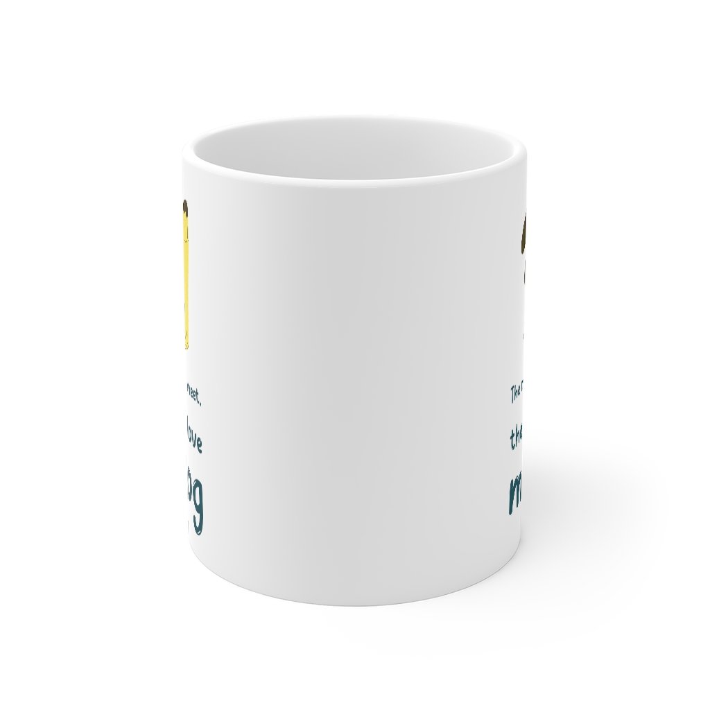 A white ceramic mug with the phrase 'The More People I Meet, The More I Love My Dog' printed on it, showcasing a classic design.