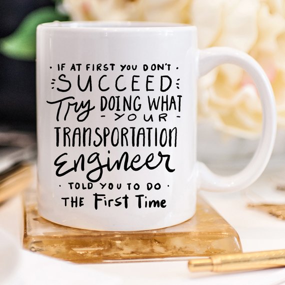 A humorous coffee mug featuring the quote about transportation engineers, made from high-quality ceramic, ideal for coffee or tea.