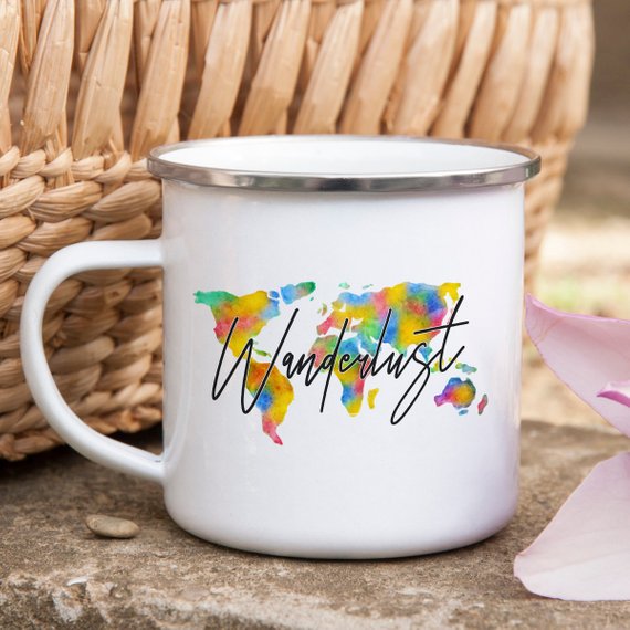 Wanderlust Enamel Mug featuring a vibrant design, crafted from cast iron with a stainless steel rim, perfect for camping and hiking.