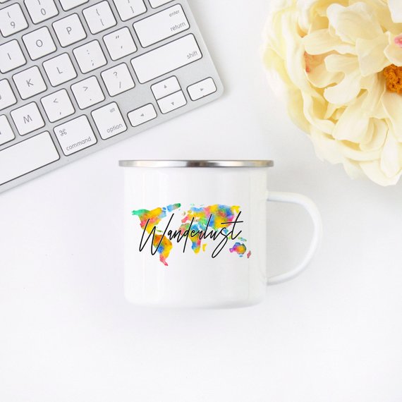 Wanderlust Enamel Mug featuring a vibrant design, crafted from cast iron with a stainless steel rim, perfect for camping and hiking.
