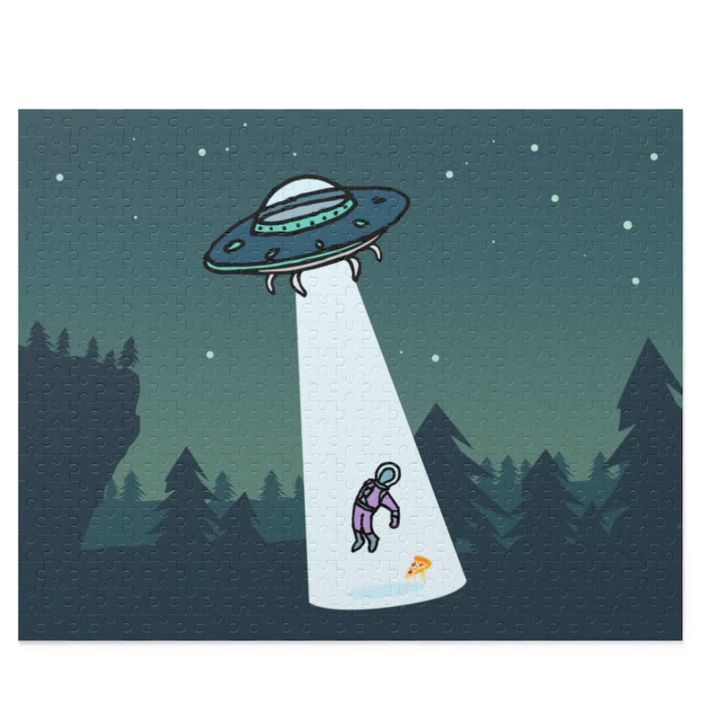 A colorful 500-piece jigsaw puzzle depicting an alien abduction scene with pizza, showcasing vibrant artwork and high-quality chipboard pieces.