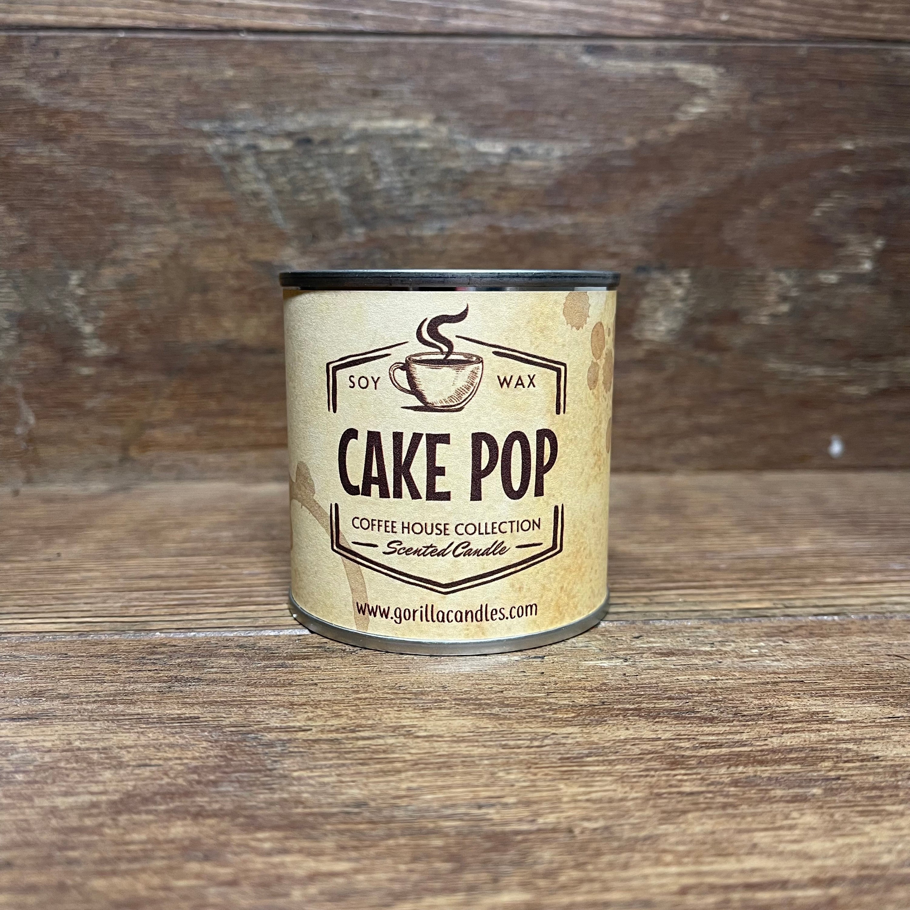 Almond Biscotti Scented Candle in a stylish paint can, showcasing its inviting aroma and eco-friendly soy wax.