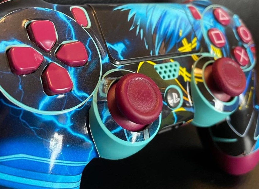 Anime Warrior Futuristic PS4 Controller Vinyl Wrap showcasing vibrant colors and intricate design, perfectly fitted on a PS4 controller.