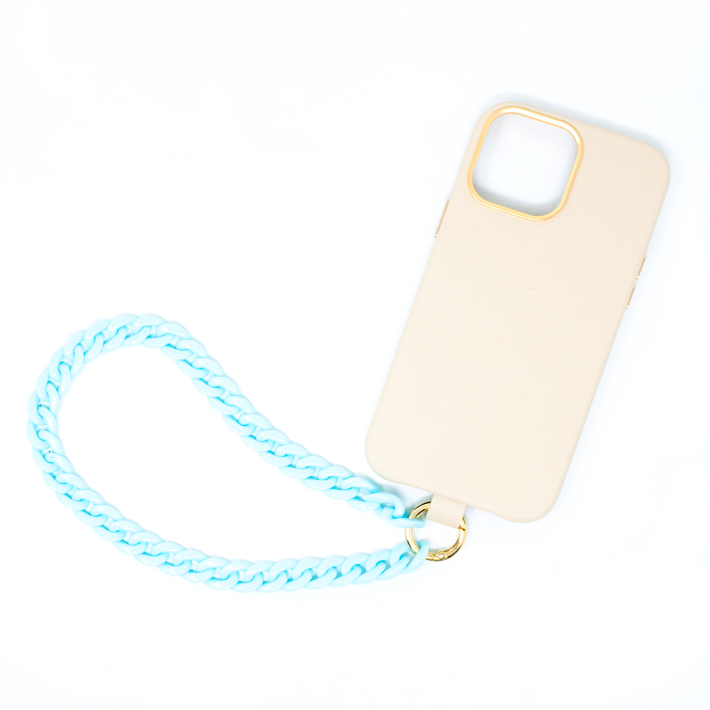 MAAD Full Wrapped Bundle featuring a light blue and beige vegan leather case with gold pleated edges and a chunky acrylic phone strap for iPhone 13 Pro.