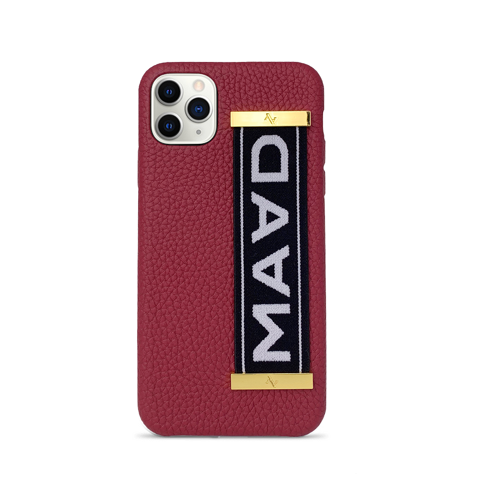 MAAD LVR Red iPhone 11 Pro Max Case made of genuine pebble leather with an elastic strap, showcasing a stylish red and black design.