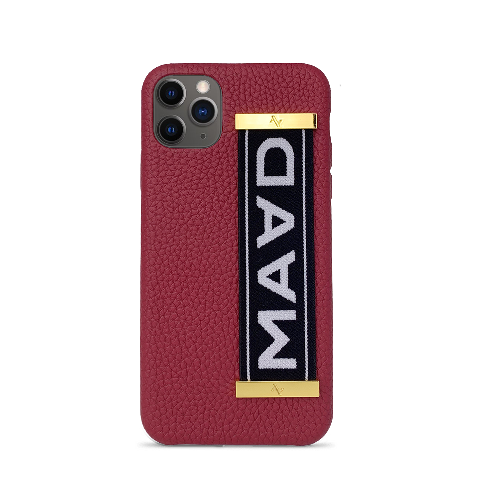 MAAD LVR Red iPhone 11 Pro Max Case made of genuine pebble leather with an elastic strap, showcasing a stylish red and black design.