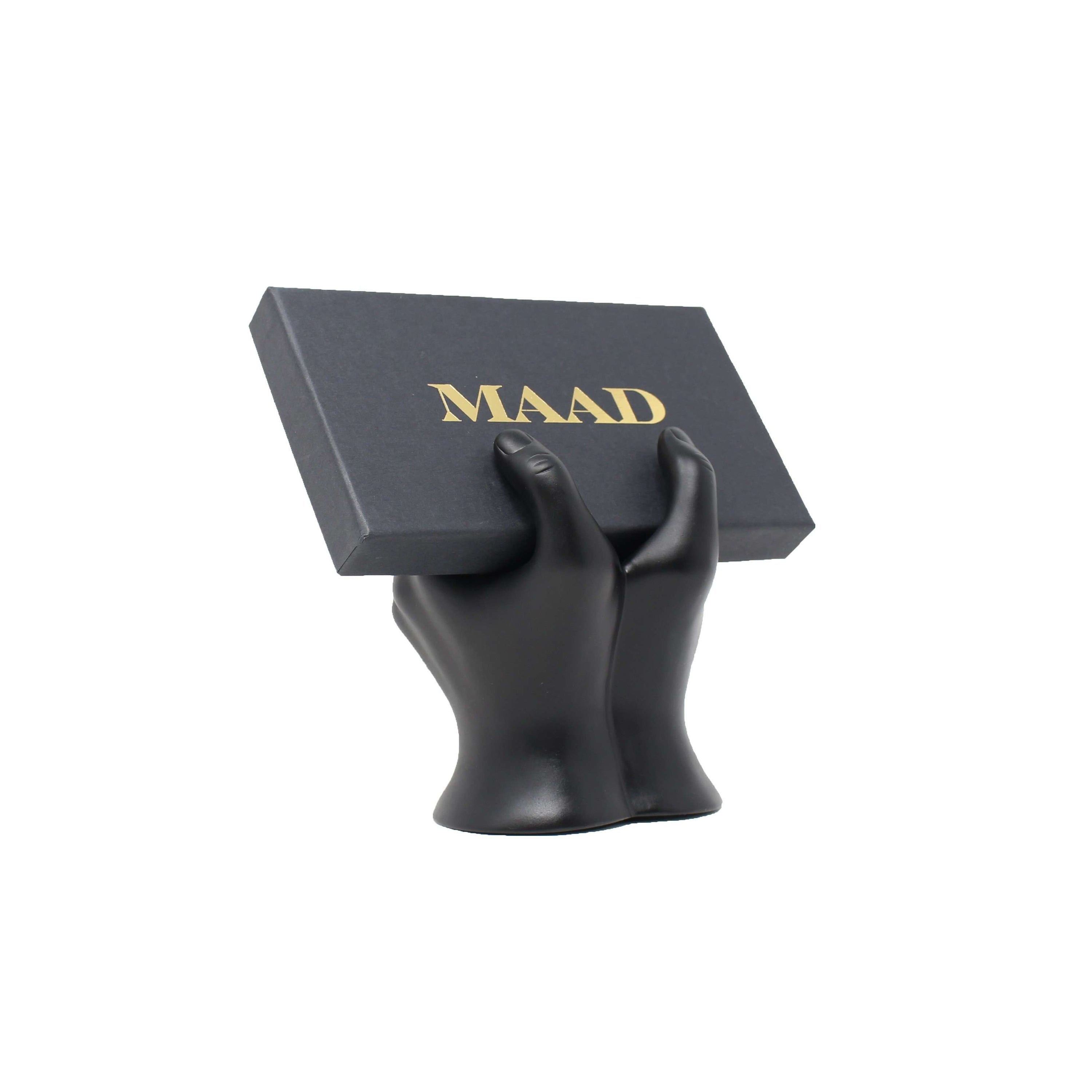 MAAD LVR Red iPhone 11 Pro Max Case made of genuine pebble leather with an elastic strap, showcasing a stylish red and black design.