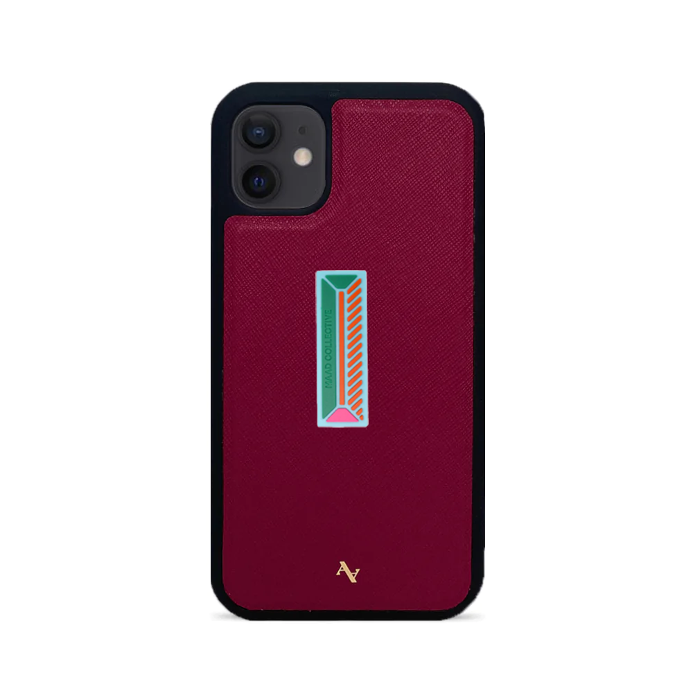 MAAD Stickers Alphabet for iPhone 12 Mini in vibrant red, showcasing customizable letters on a sleek phone case.