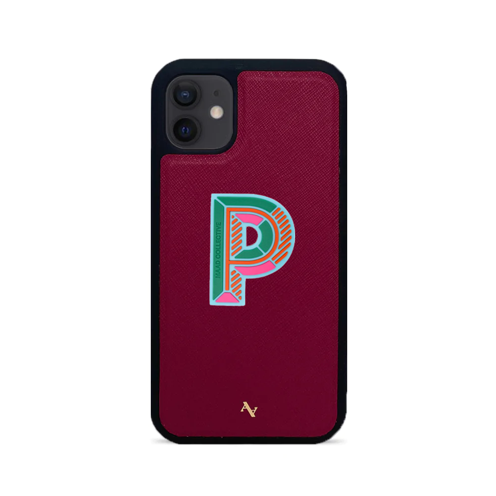 MAAD Stickers Alphabet for iPhone 12 Mini in vibrant red, showcasing customizable letters on a sleek phone case.