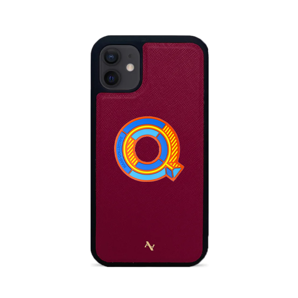 MAAD Stickers Alphabet for iPhone 12 Mini in vibrant red, showcasing customizable letters on a sleek phone case.